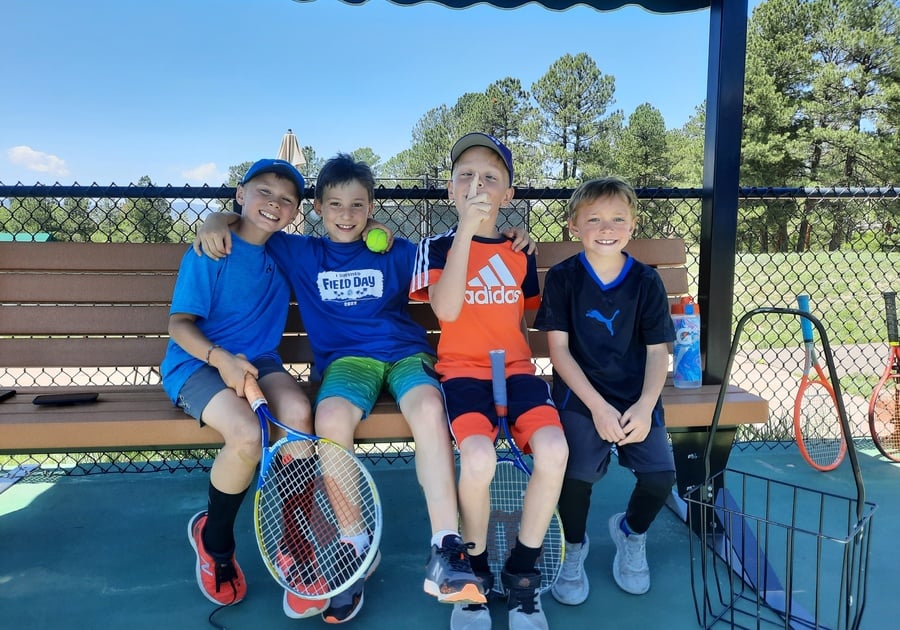 children goofing off and having fun at Castle Rock Tennis camp