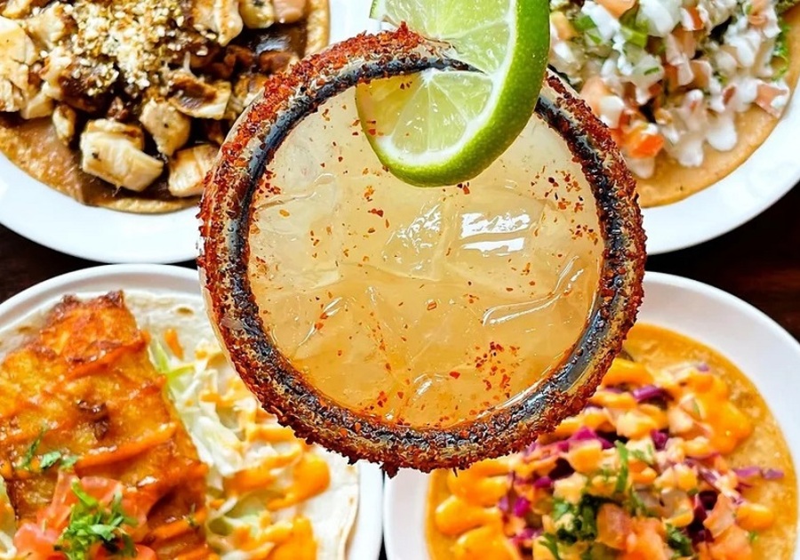 four mexican dishes topped with a margarita