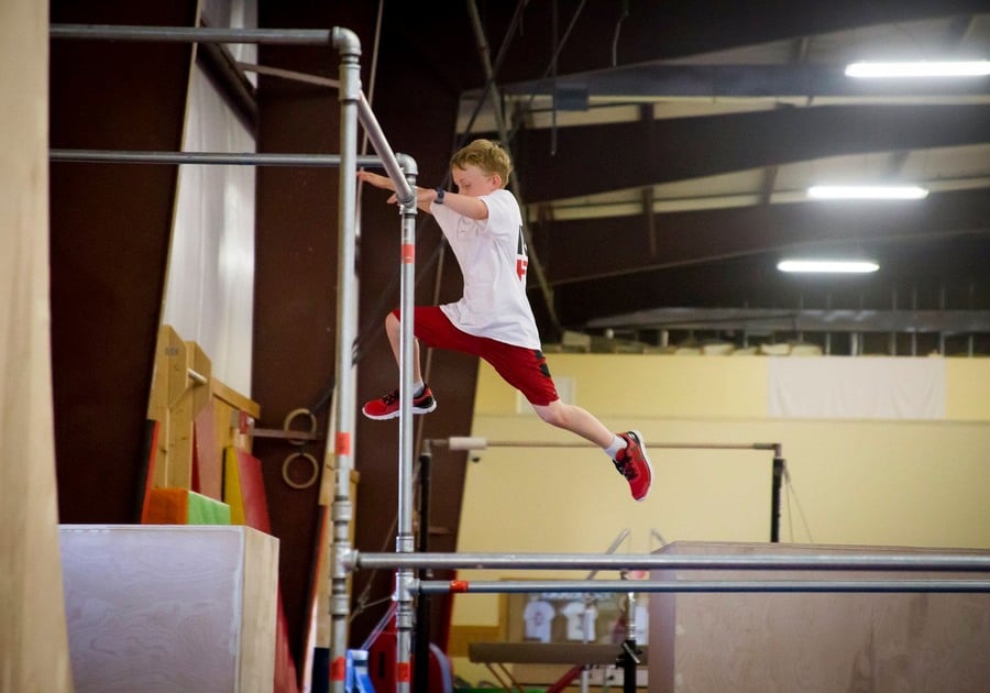 Young boy performing acrobatics
