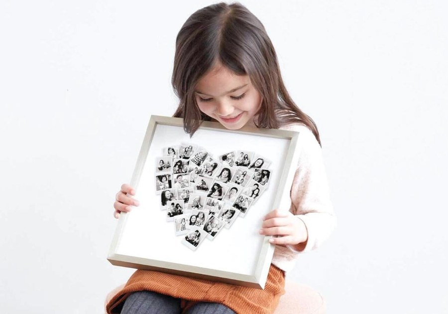 Girl holding picture from Minted, certifikid deals