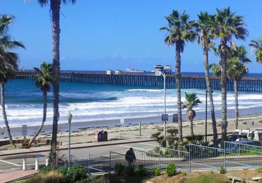 Photo of Oceanside Pier with Naval Craft in the background