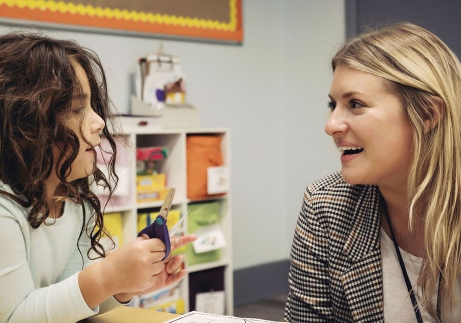 teacher talking to student