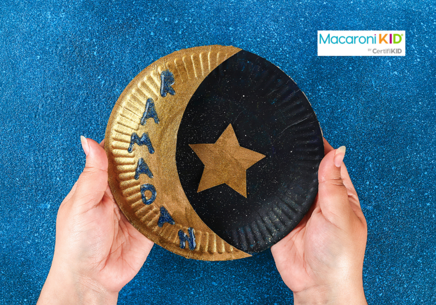 Diy Ramadan kareem crescent moon with a star from a disposable cardboard plate and gold paint.