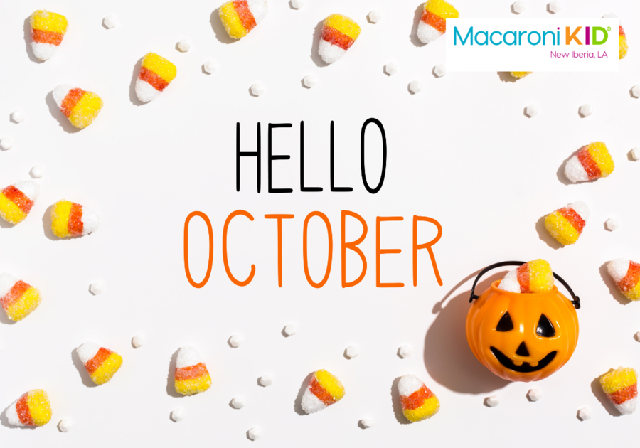 Hello October on white background with pumpkin and candy corn