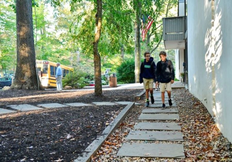 2 boys walking out front 600 px 