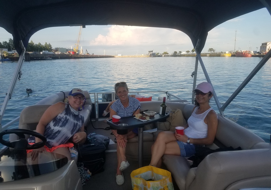Three woman on boat