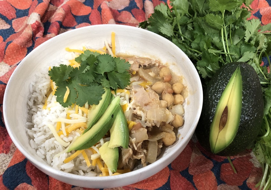 White Chili served with rice, cheese, avocado and cilantro