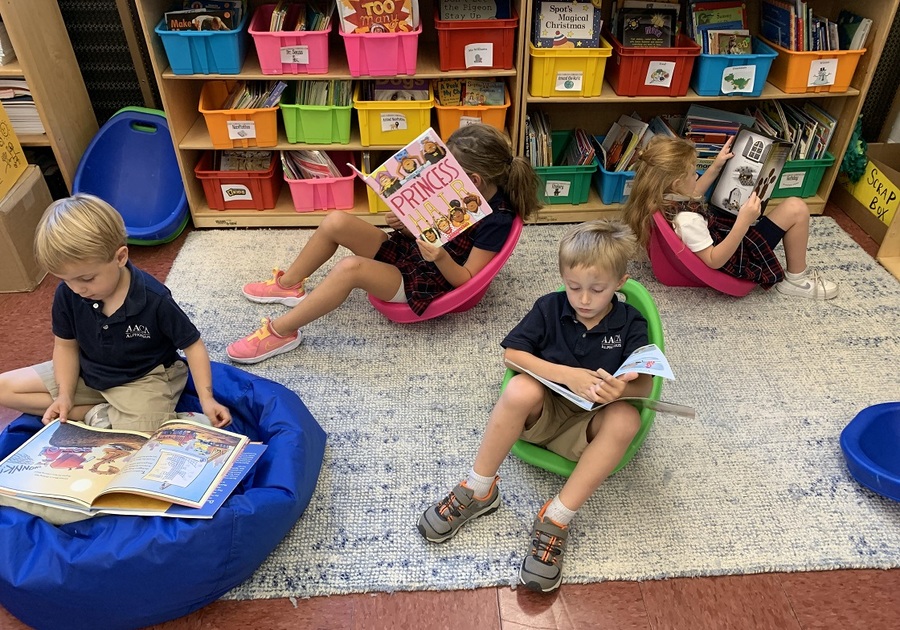 kids reading in a library