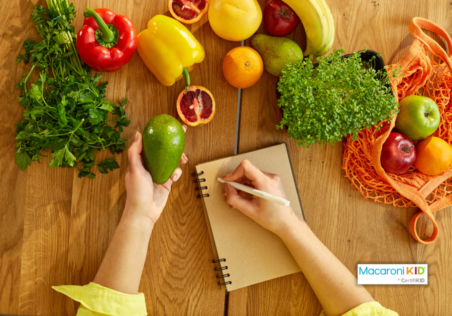 meal planning image -- veggies and notebook