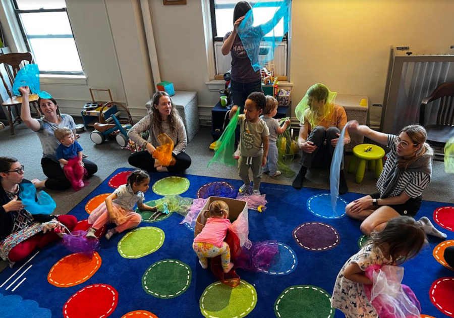 preschoolers playing with scarfs