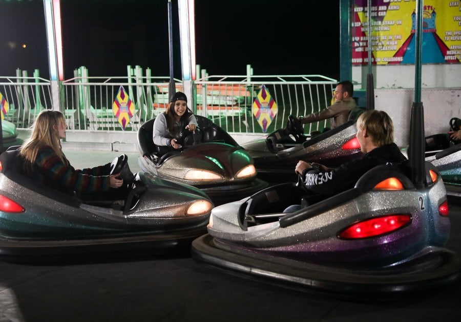 kids riding in bumper cars