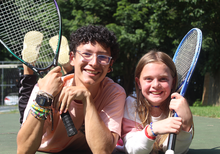 teens with tennis rackets