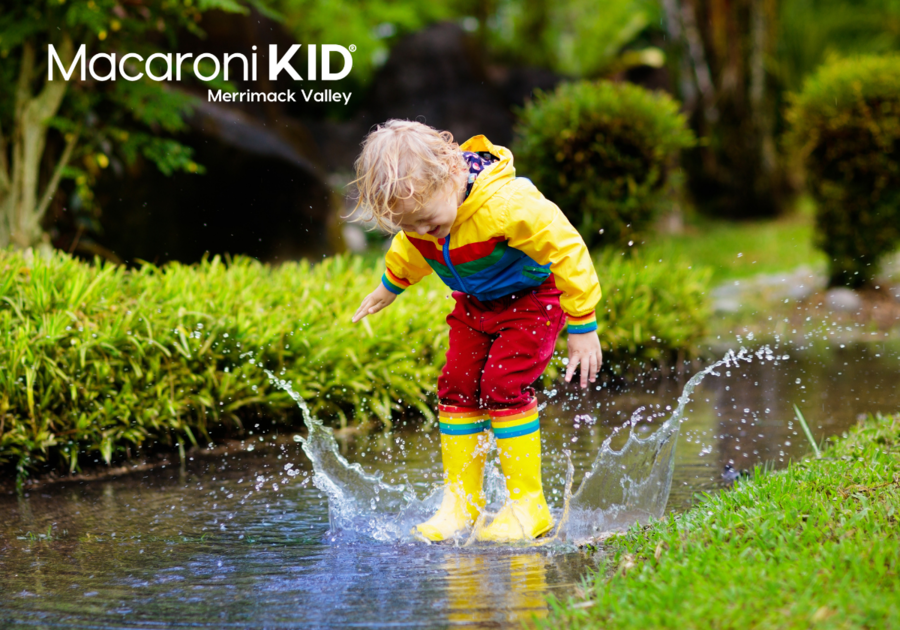 Child stomping in puddle