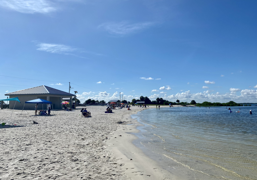 Sandy Beach With Picnic Structures