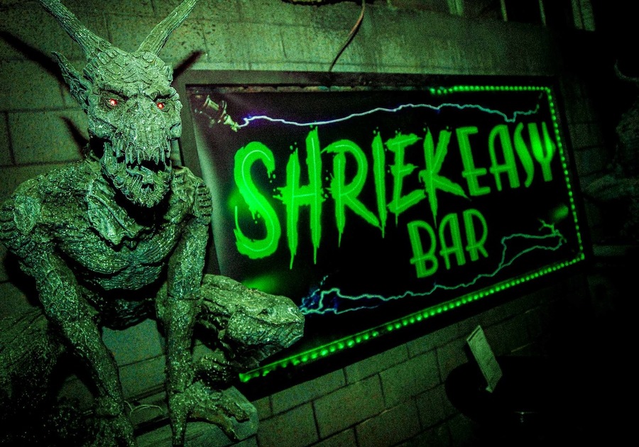 ghoul with sign to shriek easy bar