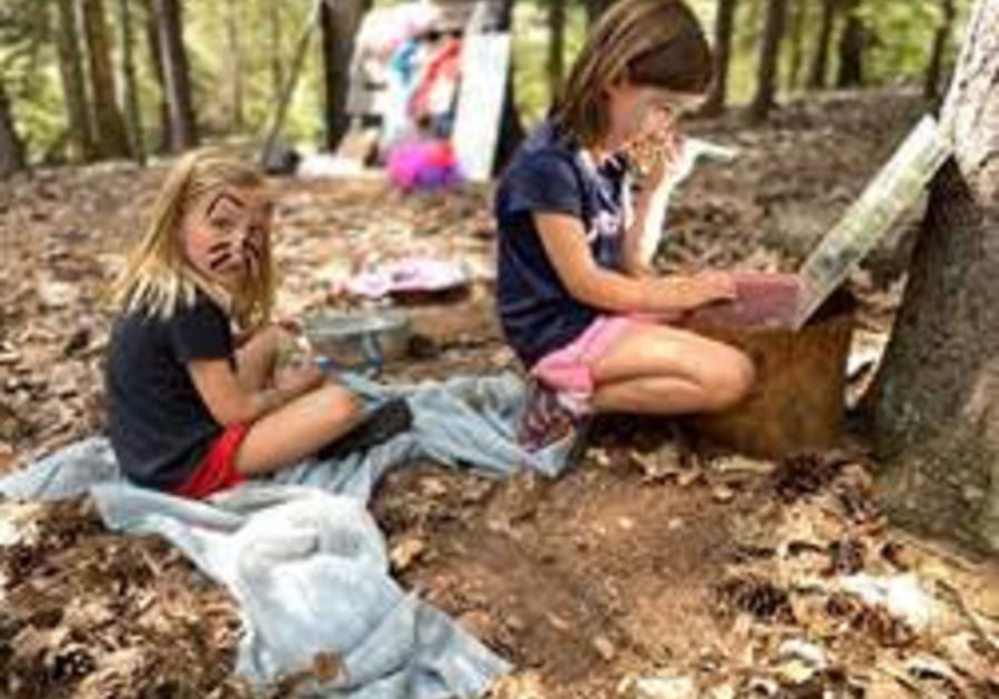 Children playing in woods