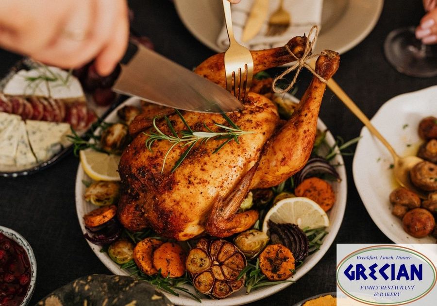 Person carving into Thanksgiving turkey