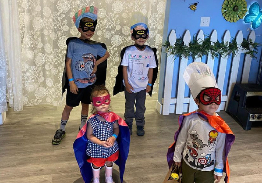 Children at a Flour Power Cooking Studios superhero-themed Birthday Party