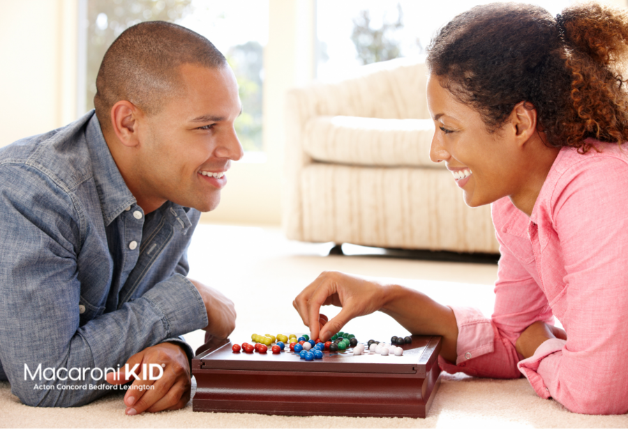Couple playing board game
