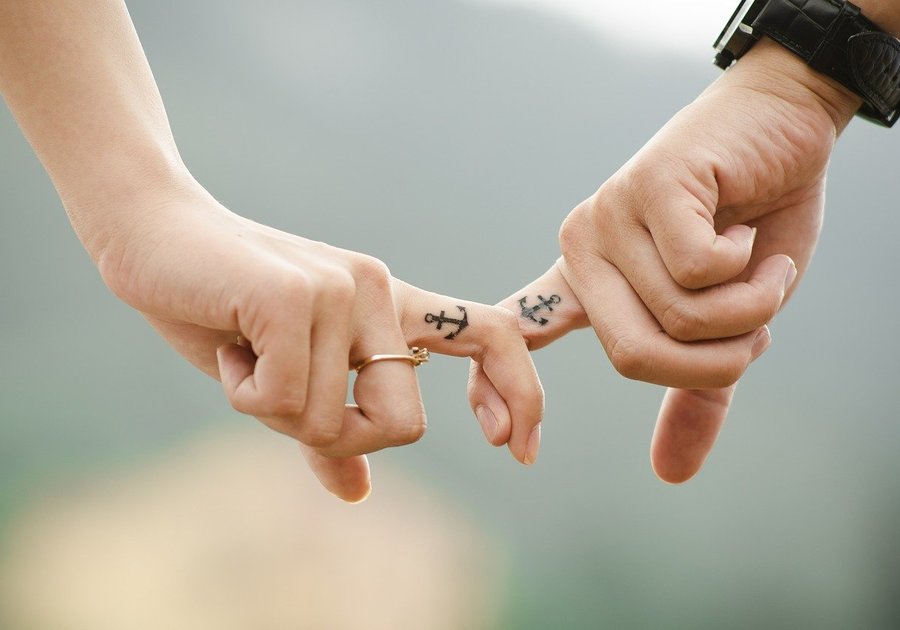 Couple holding hands
