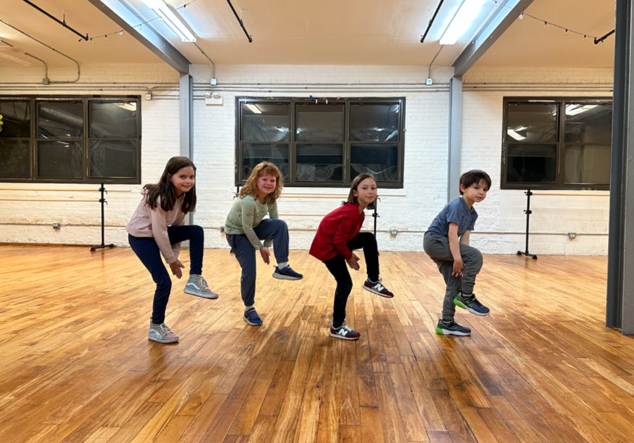 4 kids dancing in studio