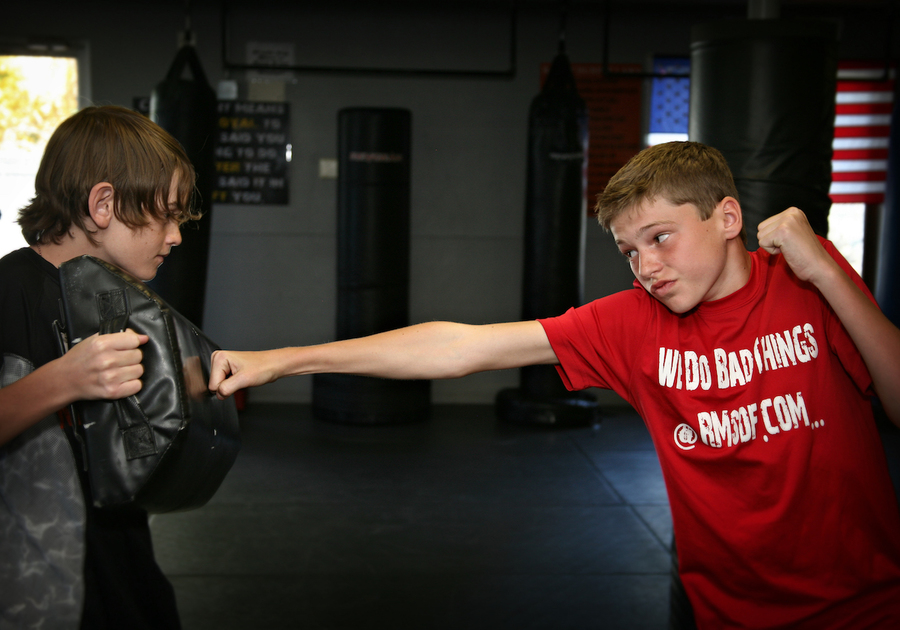 two young teen boys practicing krav maga martial arts