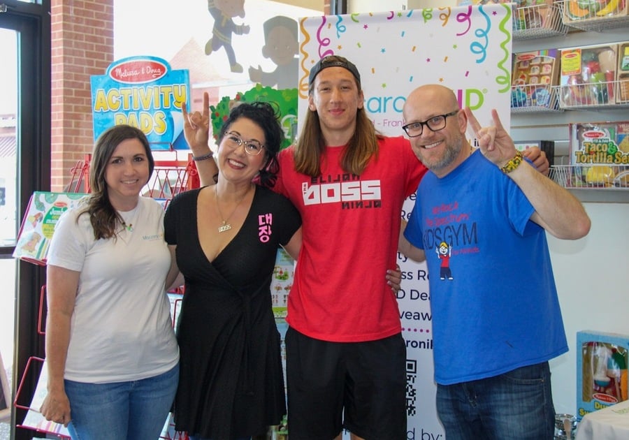 Franklin TN Publisher Heather Griffin, with America Ninja Warrior Elijah Browning, his mother, Renee Browning, and local gym owner Steve Komarnitsky