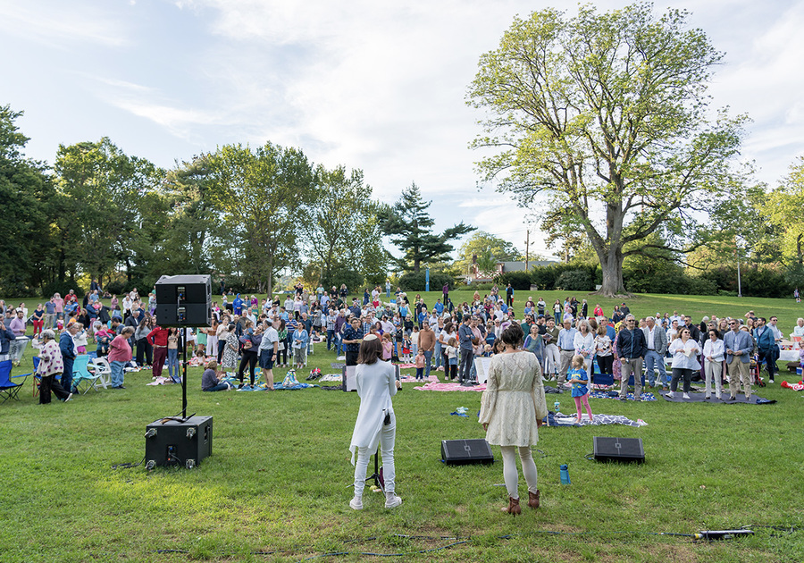 Oheb Shalom Congregation -  Rosh Hashanah in the Park, Maplewood Memorial Park (NJ) - Oct 2 2024; graphic: two women speaking to a crowd on grass.