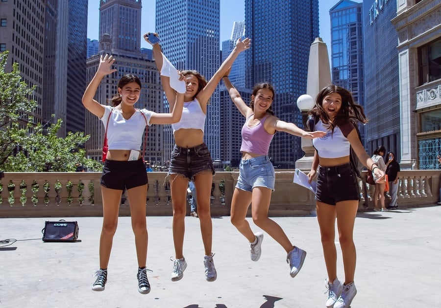 four teen girls at wrigley building