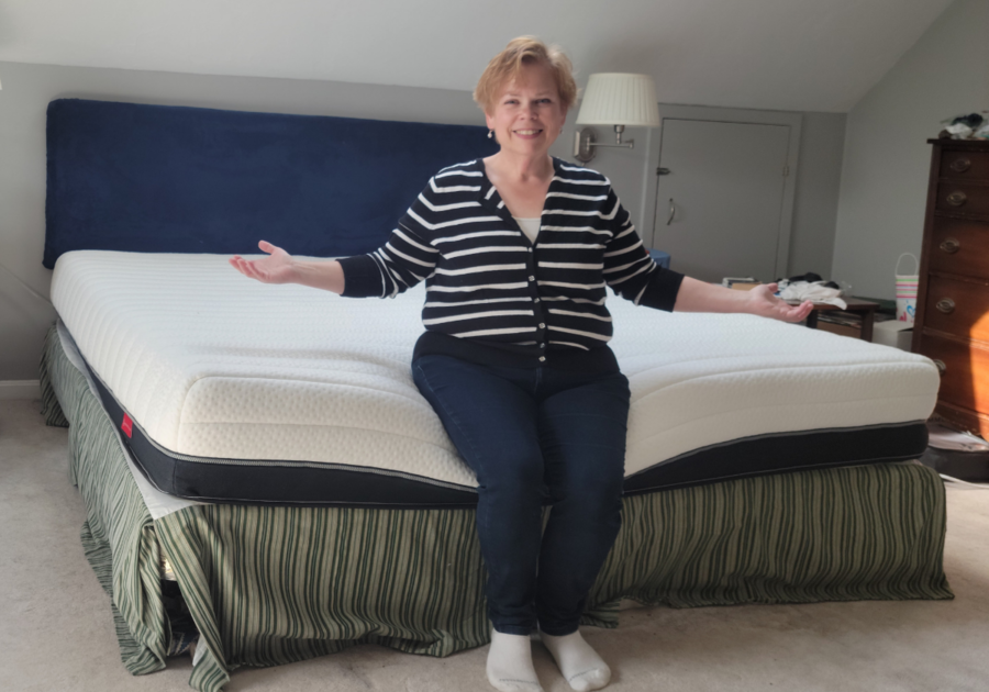 Woman sitting on mattress