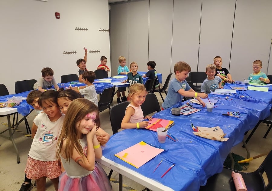 kids painting at tables