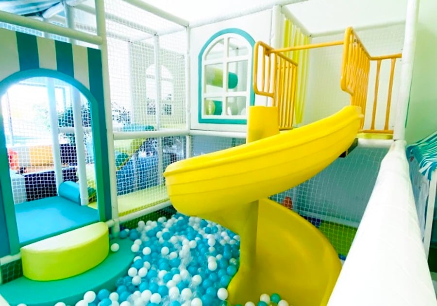 yellow slide into ball pit