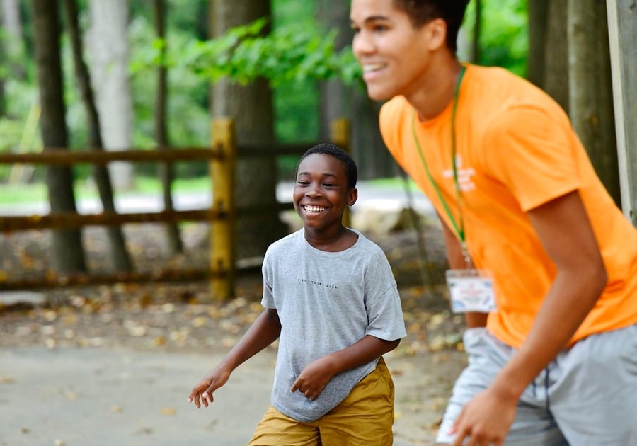 two boys playing outside