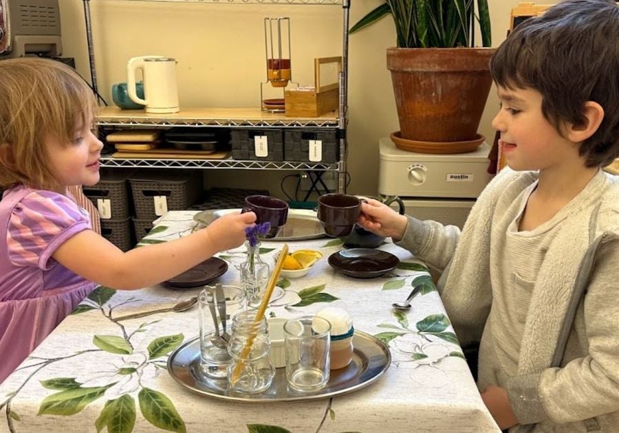 boy and girl having a tea party