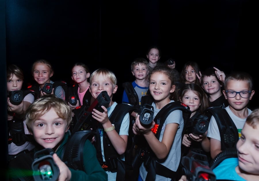 group of kids playing lazer tag
