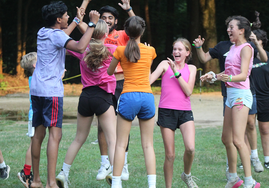 group of teens jumping