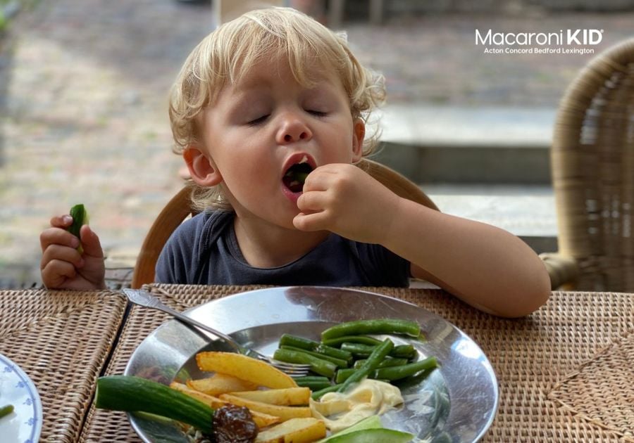 Child eating vegetables