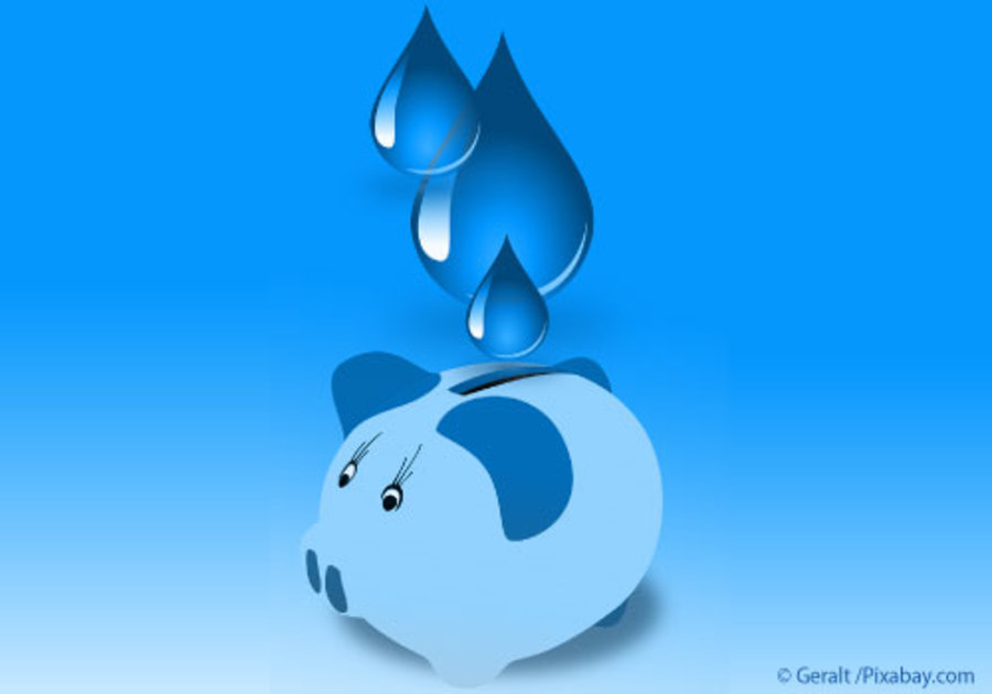 Water drops going into piggy bank