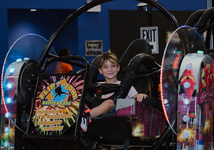 boy in flipping bumper car