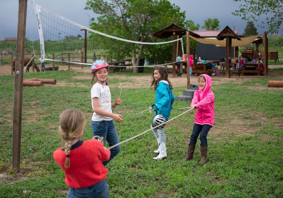 children playing games at Big Horn Stables summer camp