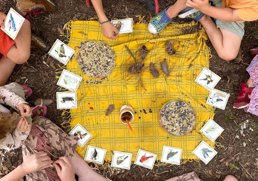 children making DIY bird feeders