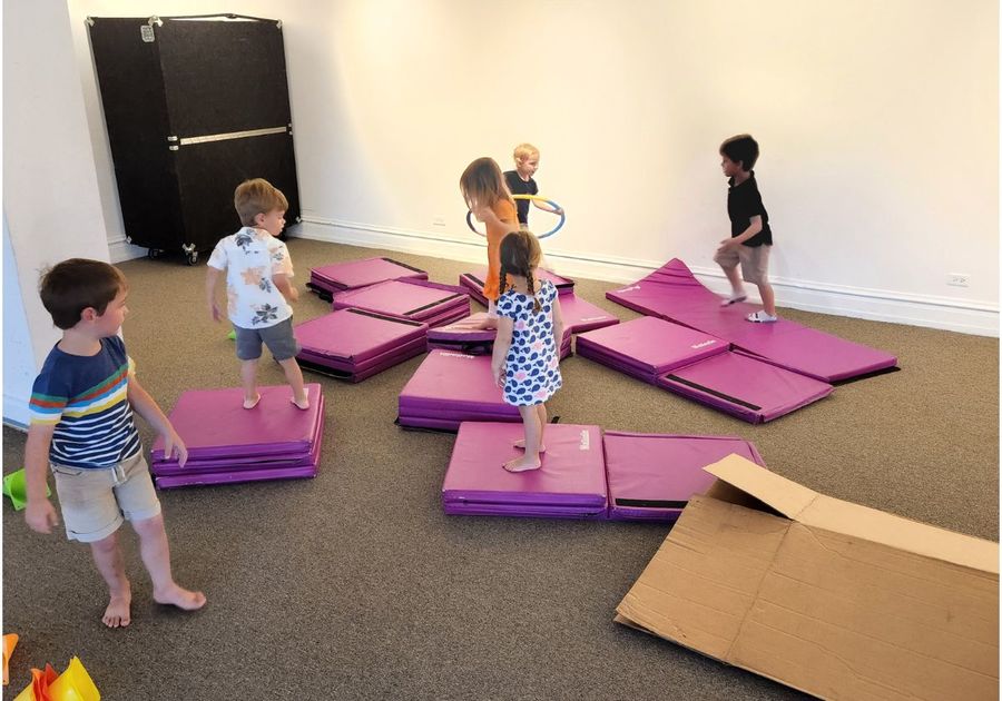 Kids playing on purple mats