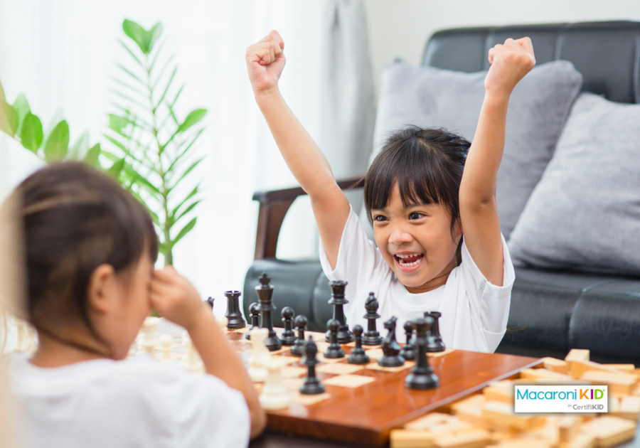 two kids playing chess