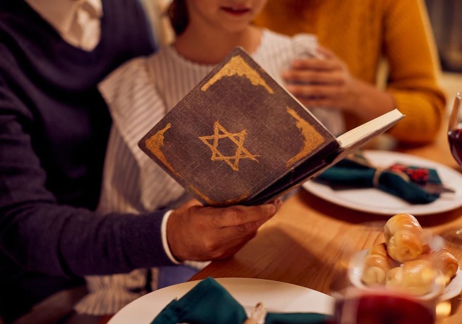 Jewish Family Celebrating Hanukkah Together 