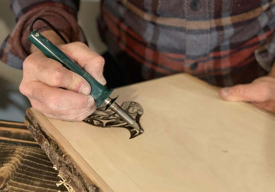 Man woodburning