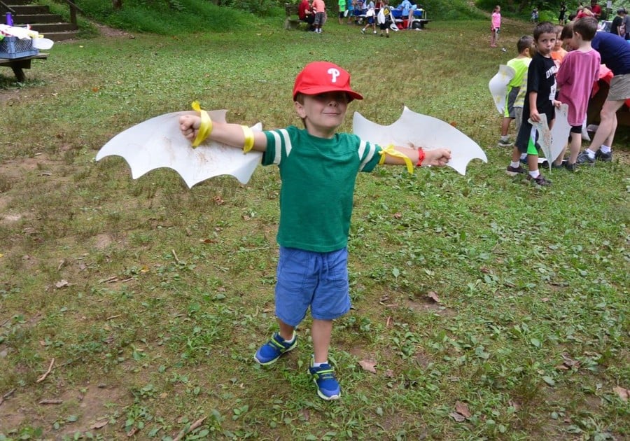 child with wings costume on at Newlin Grist Mill