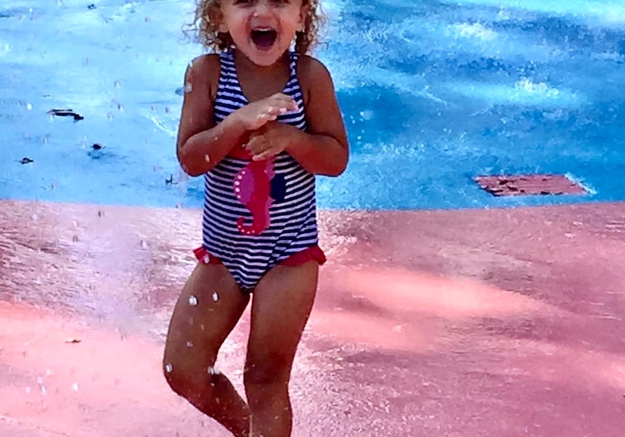 Little girl playing in Henle Park Leetsdale Splash Pad