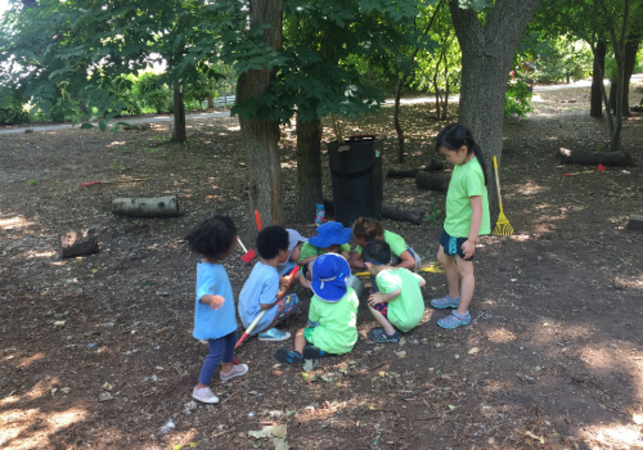 children digging in mud