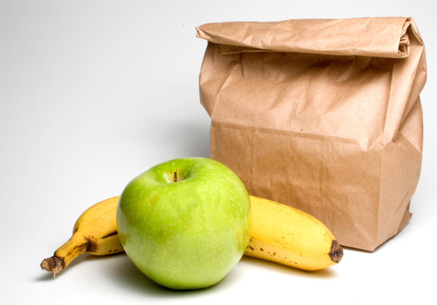Brown lunch bag with fruit
