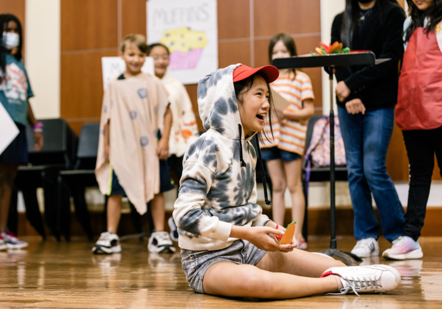 girl on floor laughing